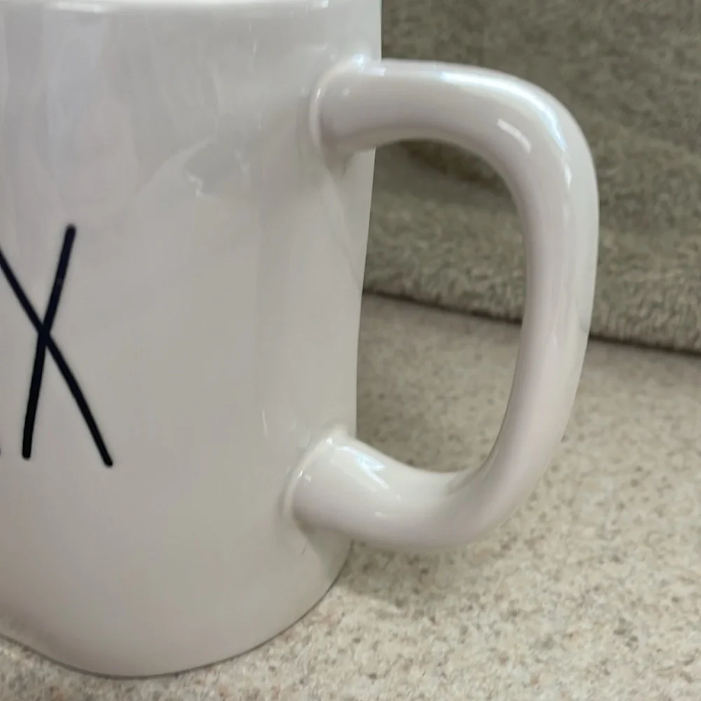 Rae Dunn “Relax” coffee mug. Classic white with black lettering.